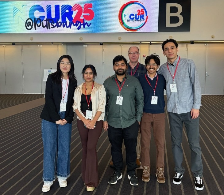 Wooster students posing for a picture at NCUR